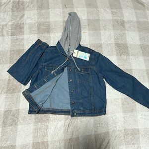 Blue jean jacket with gray hoodie